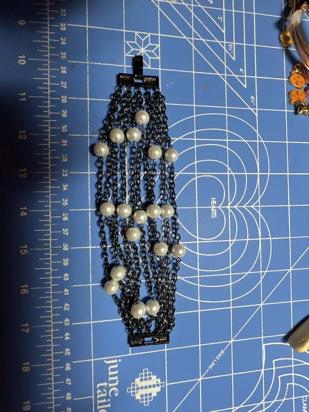 Multi-Strand Gunmetal Chain and Faux Pearl Bracelet